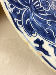 A large Chinese blue and white armorial dish with the arms of Pelgrom for the Dutch market, Kangxi