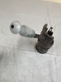 Two Vietnamese waterpipes in wood, silver and metal, one with mother-of-pearl inlay, 19th C.