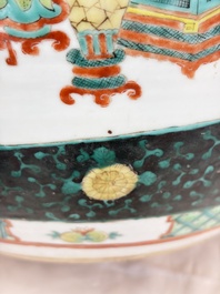 A Chinese famille verte black-ground jardini&egrave;re with birds, antiquities and flowers, 19th C.
