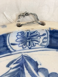 A blue and white Dutch Delftware 'The King's Wig' plaque, probably Rotterdam, 18th C.