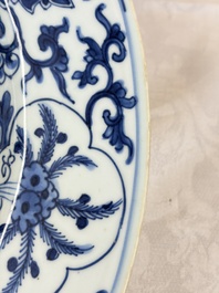 A large Chinese blue and white armorial dish with the arms of Pelgrom for the Dutch market, Kangxi
