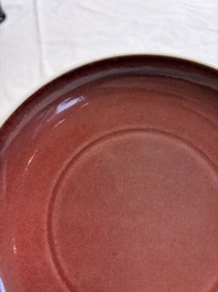 A Chinese copper-red-glazed plate, a meiping vase and two water pots, Kangxi marks, 19/20th C.