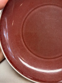 A Chinese copper-red-glazed plate, a meiping vase and two water pots, Kangxi marks, 19/20th C.