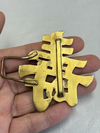 A Chinese enamelled silver 'Dragon' napkin ring, a pair of silver buckles and a pair of cloisonn&eacute; buckles, 19/20th C.