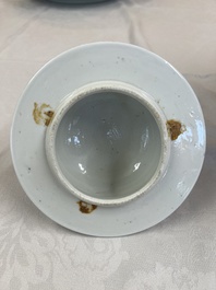 A Chinese gilt-decorated powder-blue-ground vase and cover, Kangxi mark, 19th C.