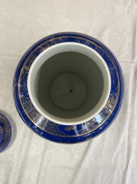 A Chinese gilt-decorated powder-blue-ground vase and cover, Kangxi mark, 19th C.
