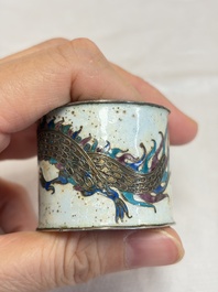 A Chinese enamelled silver 'Dragon' napkin ring, a pair of silver buckles and a pair of cloisonn&eacute; buckles, 19/20th C.