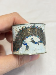 A Chinese enamelled silver 'Dragon' napkin ring, a pair of silver buckles and a pair of cloisonn&eacute; buckles, 19/20th C.
