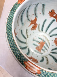 A Chinese famille verte black-ground jardini&egrave;re with birds, antiquities and flowers, 19th C.