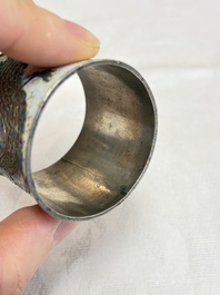 A Chinese enamelled silver 'Dragon' napkin ring, a pair of silver buckles and a pair of cloisonn&eacute; buckles, 19/20th C.