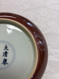 A Chinese copper-red-glazed plate, a meiping vase and two water pots, Kangxi marks, 19/20th C.