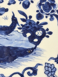 A large Chinese blue and white armorial dish with the arms of Pelgrom for the Dutch market, Kangxi