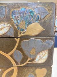 A Japanese mother-of-pearl-inlaid lacquer five-tier stacking box with two covers and a tray, 19/20th C.