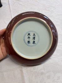 A Chinese copper-red-glazed plate, a meiping vase and two water pots, Kangxi marks, 19/20th C.