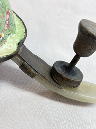 A Chinese celadon jade belt hook mounted as a handle on a Canton enamel bowl, Qing