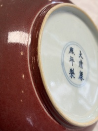 A Chinese copper-red-glazed plate, a meiping vase and two water pots, Kangxi marks, 19/20th C.