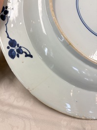 A large Chinese blue and white armorial dish with the arms of Pelgrom for the Dutch market, Kangxi