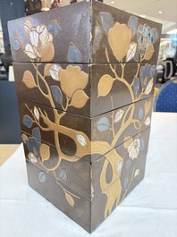 A Japanese mother-of-pearl-inlaid lacquer five-tier stacking box with two covers and a tray, 19/20th C.