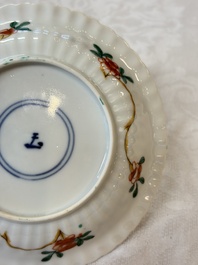 Four Chinese famille verte cups and seven saucers, 19th C.