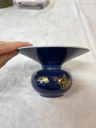 A Chinese powder-blue-ground gilt-decorated spittoon and two gilt-bronze-mounted vases, 18th C.