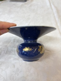 A Chinese powder-blue-ground gilt-decorated spittoon and two gilt-bronze-mounted vases, 18th C.