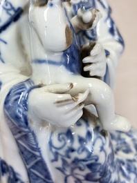 A Chinese blue and white 'Guanyin and child' group, Qianlong