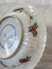 Four Chinese famille verte cups and seven saucers, 19th C.