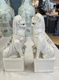 A pair of large Chinese Dehua blanc de Chine buddhist lion joss stick holders, 19th C.