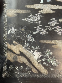 A rare large square Chinese laque burgaut&eacute; tray depicting a mountainous garden, Kangxi