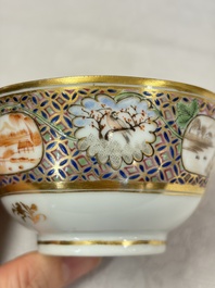A pair of Chinese Canton famille rose cups and saucers with figural design, Daoguang