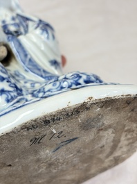A Chinese blue and white 'Guanyin and child' group, Qianlong