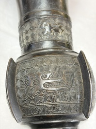 A pair of Chinese archaistic bronze 'Gu' vases, 18th C.