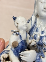 A Chinese blue and white 'Guanyin and child' group, Qianlong