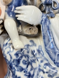 A Chinese blue and white 'Guanyin and child' group, Qianlong