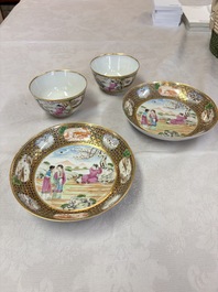 A pair of Chinese Canton famille rose cups and saucers with figural design, Daoguang