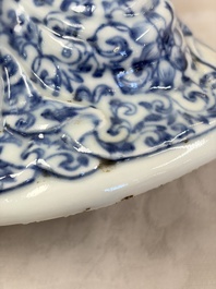 A Chinese blue and white 'Guanyin and child' group, Qianlong