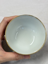 A pair of Chinese Canton famille rose cups and saucers with figural design, Daoguang