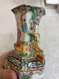 A pair of Chinese Canton famille rose hat stands, a covered vase, a vase and a bowl, 19th C.