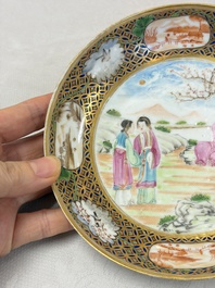 A pair of Chinese Canton famille rose cups and saucers with figural design, Daoguang