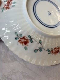 Four Chinese famille verte cups and seven saucers, 19th C.