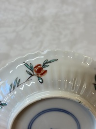 Four Chinese famille verte cups and seven saucers, 19th C.