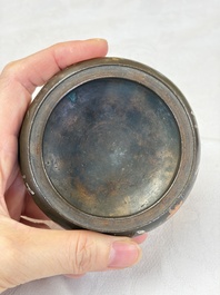 A Chinese or Vietnamese silver-inlaid copper reticulated spherical censer and a silver- and copper-inlaid bronze tripod censer, 19th C.