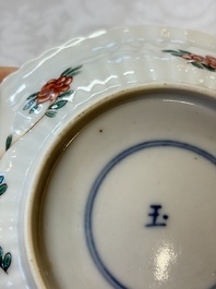 Four Chinese famille verte cups and seven saucers, 19th C.