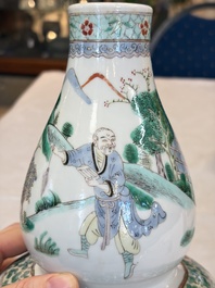 A Chinese famille rose spittoon, a famille verte covered double-gourd vase and a gilt-decorated coral-red-ground hat stand, Daoguang mark, 19th C.