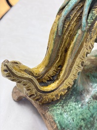 A pair of Chinese sancai-glazed 'Phoenix' roof tiles, Ming