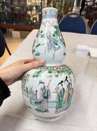 A Chinese famille rose spittoon, a famille verte covered double-gourd vase and a gilt-decorated coral-red-ground hat stand, Daoguang mark, 19th C.