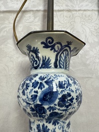 A pair of blue and white Dutch Delft garlic-head vases mounted as lamps, 18th C.