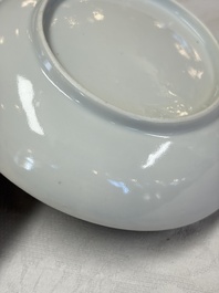 A pair of Chinese Canton famille rose cups and saucers with figural design, Daoguang