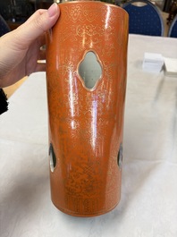 A Chinese famille rose spittoon, a famille verte covered double-gourd vase and a gilt-decorated coral-red-ground hat stand, Daoguang mark, 19th C.