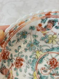 Four Chinese famille verte cups and seven saucers, 19th C.